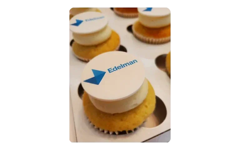 Custom branded cupcakes with Eldelman logo