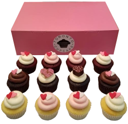 Toronto Cupcakes Valentine's Day cupcake with a heart-shaped chocolate truffle
